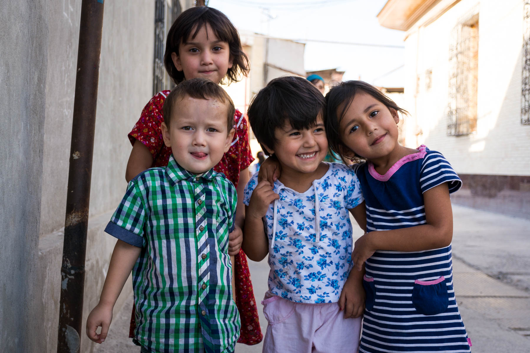 Children posing on the street in Samarkand, Uzbekistan - Lost With Purpose