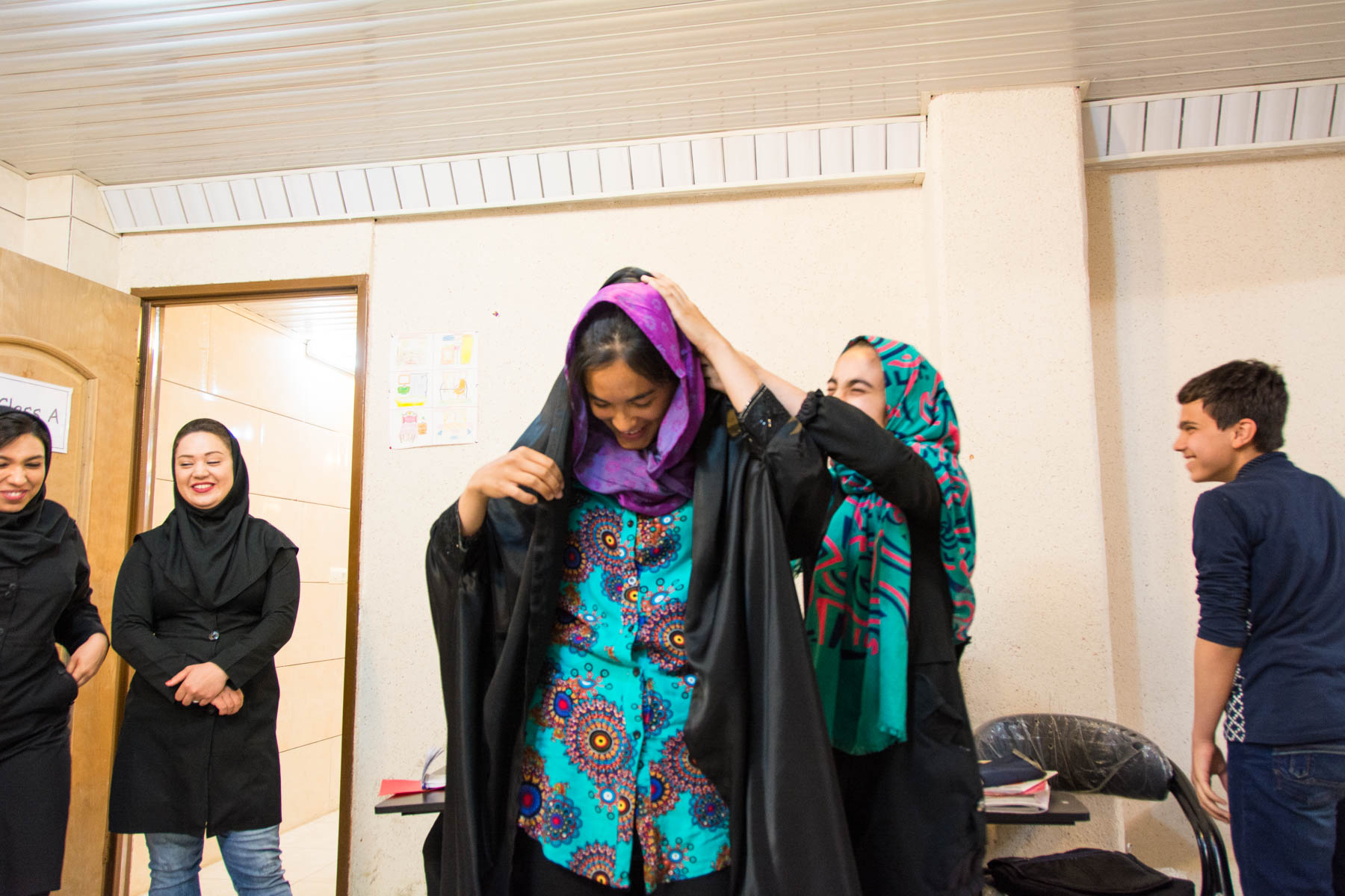 Dressing up in chador in Mobarakeh, Iran.
