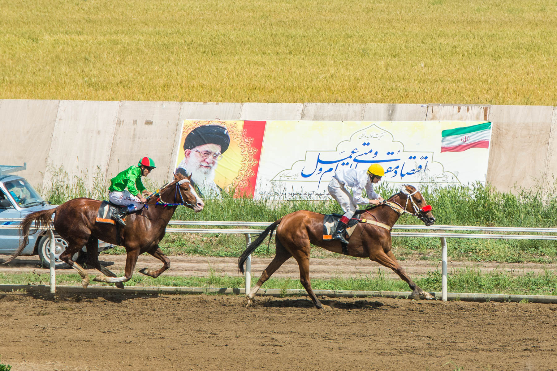 Riders finishing a race at the horse races in Gonbad-e Kavus, Iran.