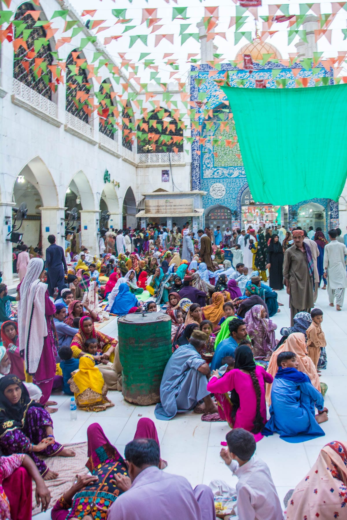 People gathering for iftar during Ramadan at the Lal Shahbaz Qalandar shrine in Sehwan, Pakistan