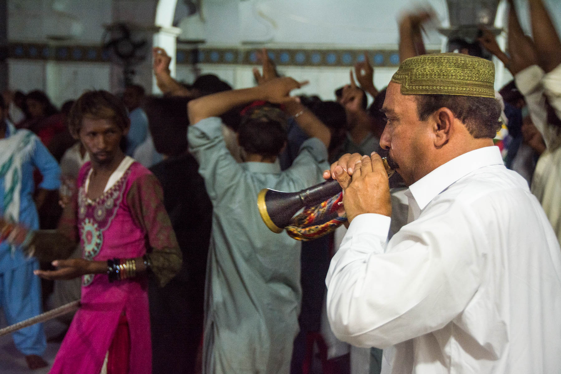 A horn player at the Lal Shahbaz Qalandar shrine in Sehwan, Iran