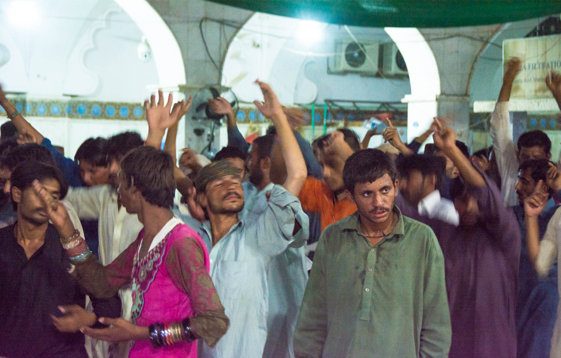 Entranced Sufi dancers during Ramadan at the Lal Shahbaz Qalandar shrine in Sehwan, Pakistan