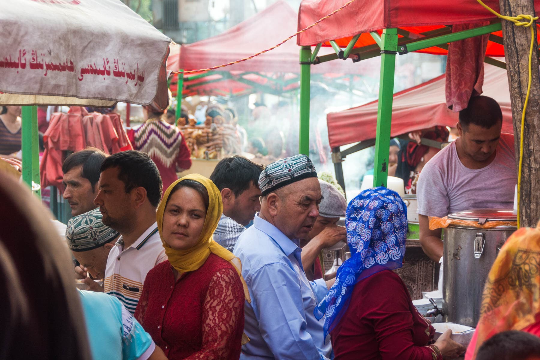 Woman staring in a Kashgar market.