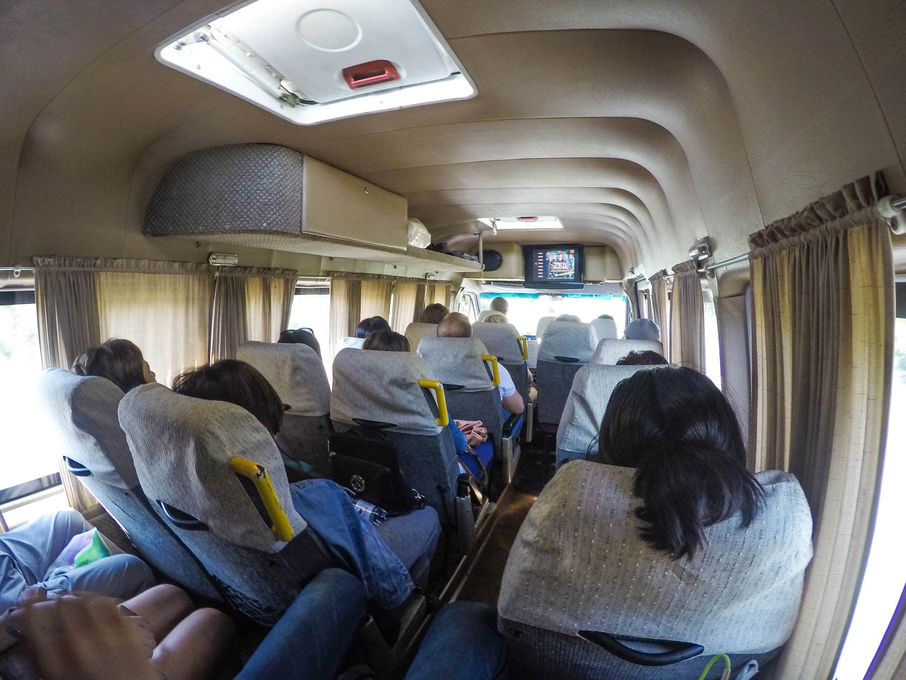 The inside of a marshrutka driving through the Kazakhstan - Kyrgyzstan border crossing at Kordai