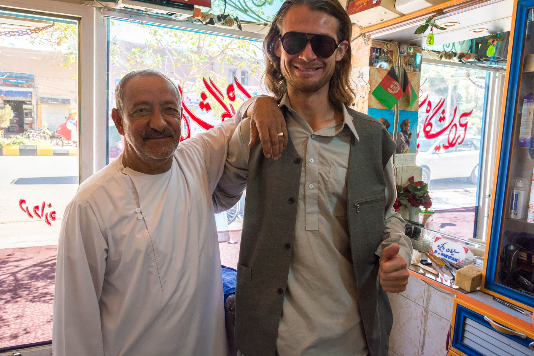 Sebastiaan posing with a friendly barber in Herat, Afghanistan - Lost With Purpose