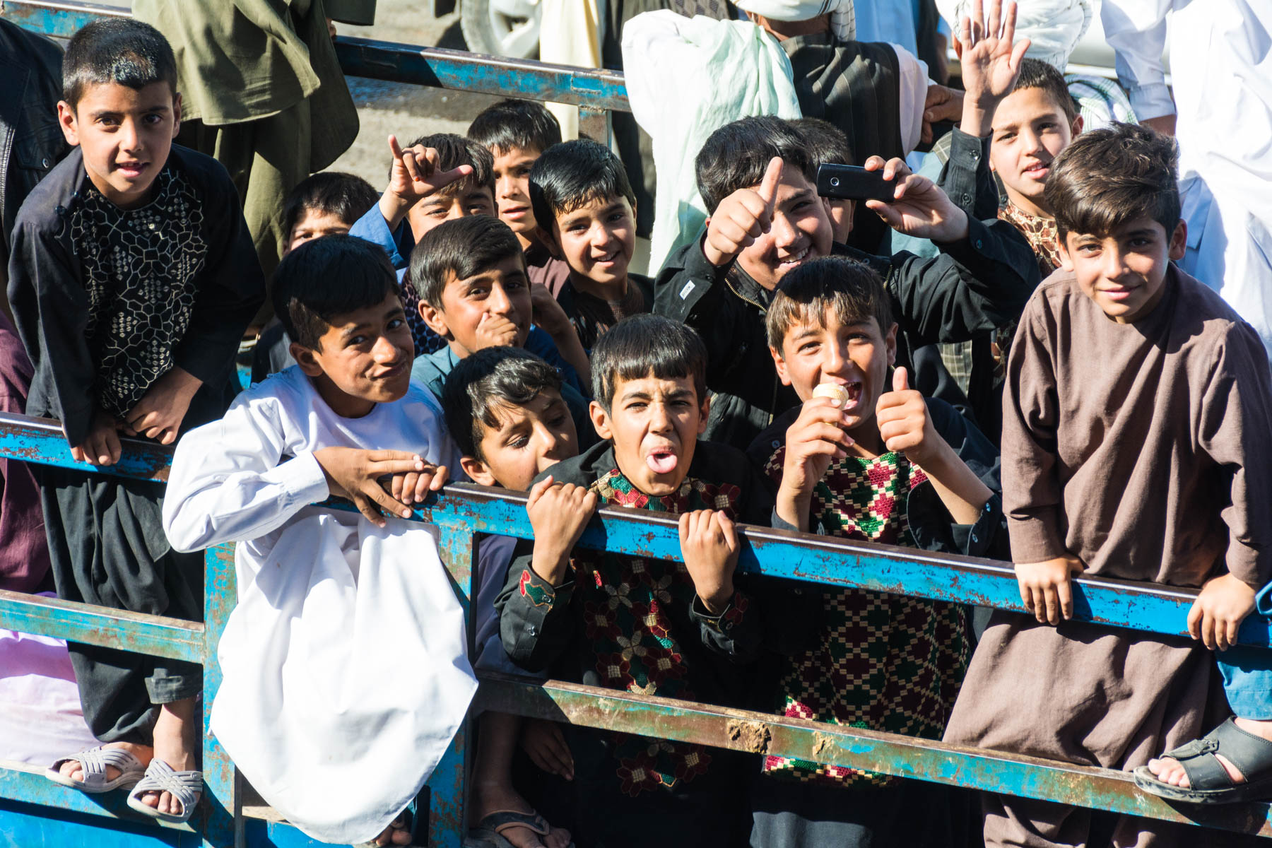 Playful Afghan boys in the back of a truck in Herat, Afghanistan - Lost With Purpose