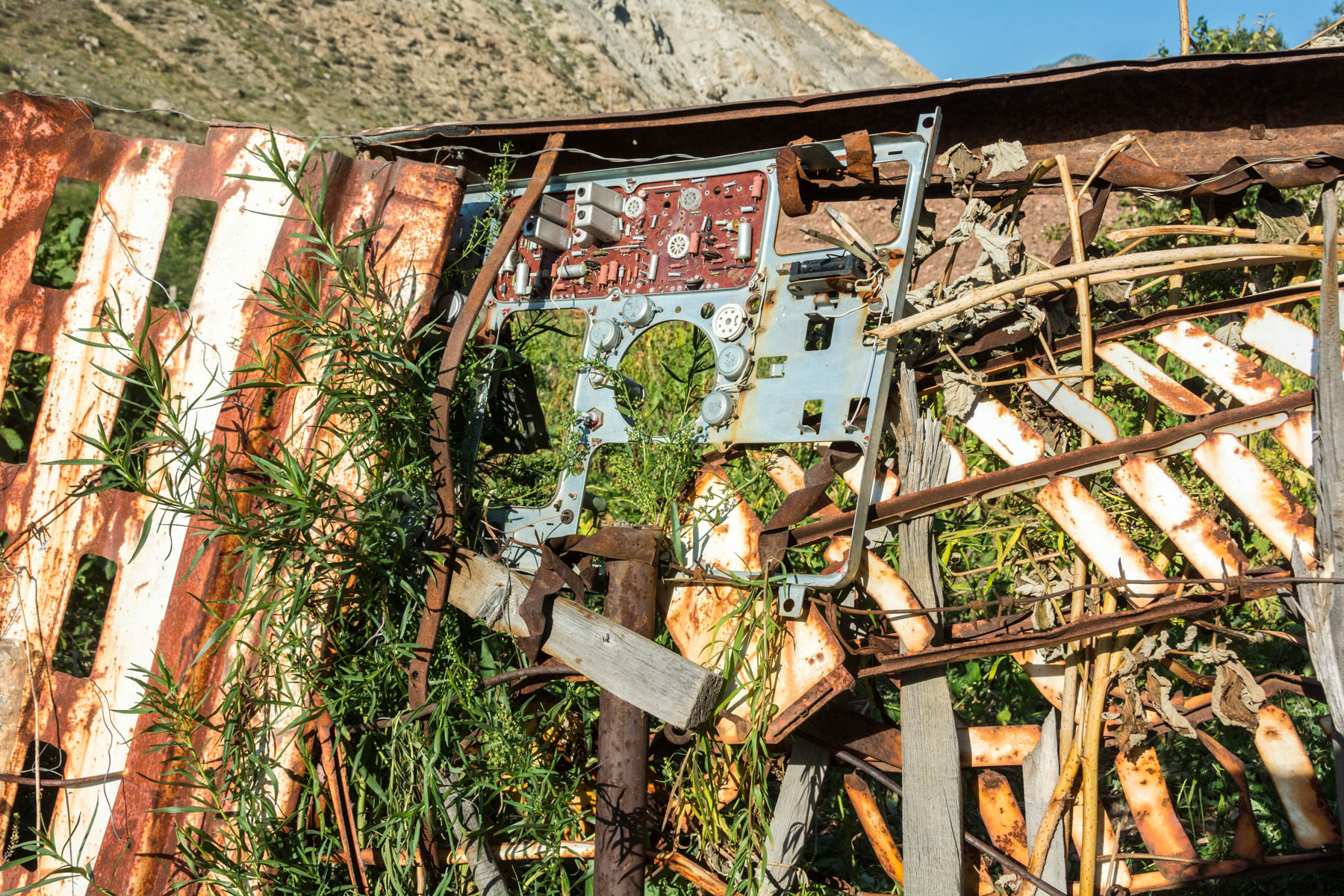 A scrap metal fence in Min Kush, Kyrgyzstan - Lost With Purpose