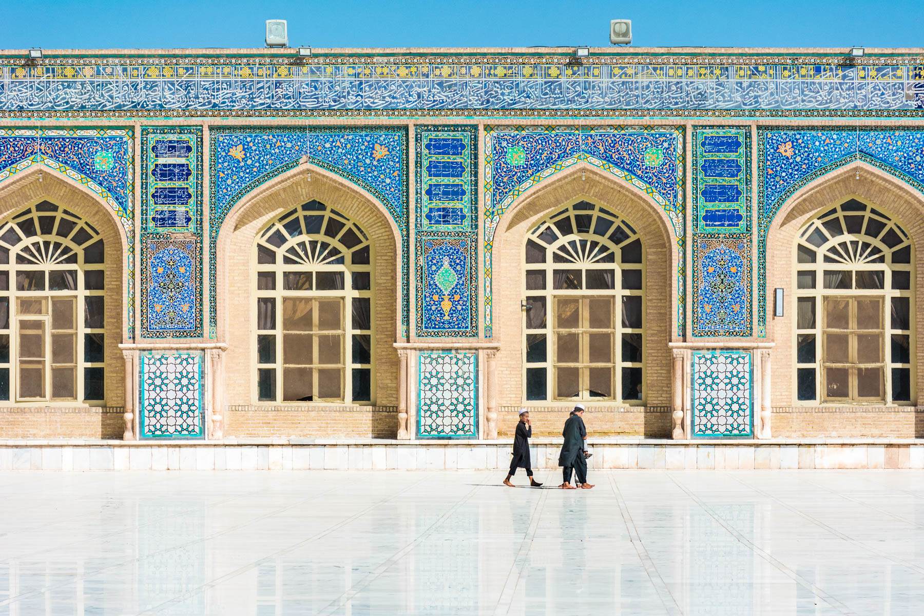 Boys walking in the Jame (Friday) Mosque in Herat, Afghanistan
