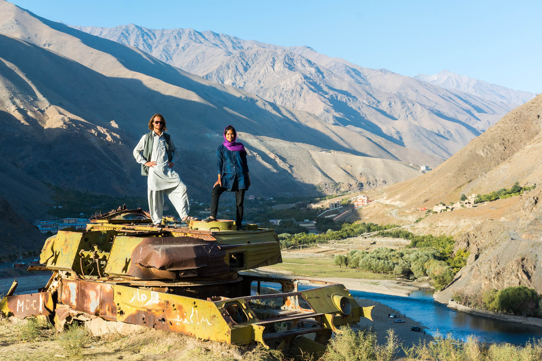 Standing on a tank in the Panjshir Valley outside of Kabul - Lost With Purpose