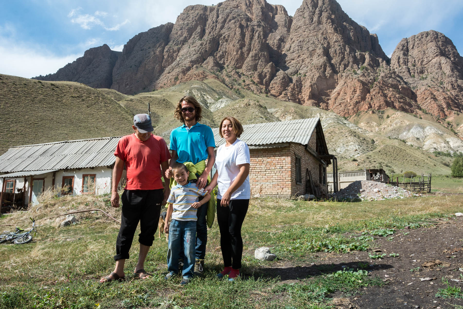 Hanging out post-chai and snacks with a super sweet family in Min Kush, Kyrgyzstan - Lost With Purpose
