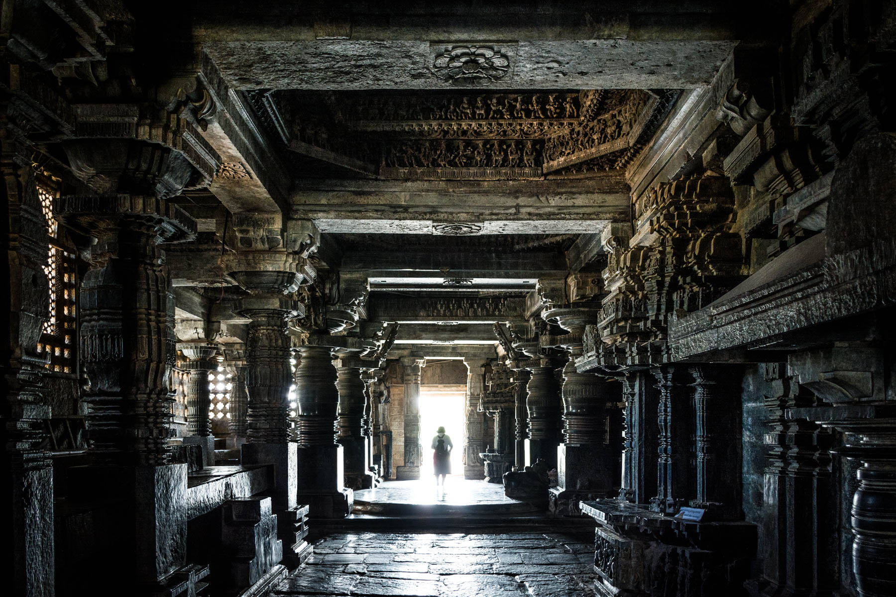 Off the beaten track places to visit in Karnataka, India - The strikingly dark interior of the Hoyaleshwara temple in Halebidu, India - Lost With Purpose