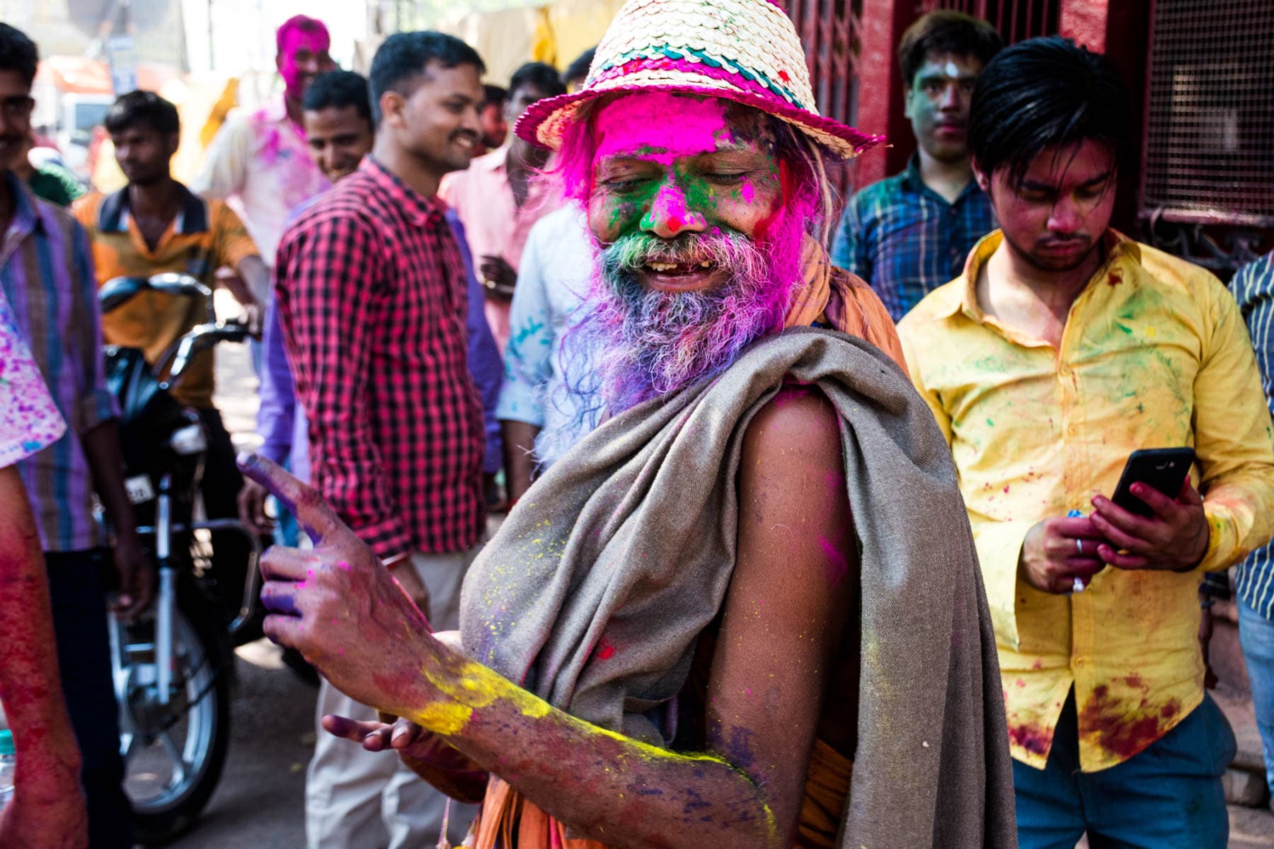 What you need know about playing Holi in Varanasi, India - Dancing baba - Lost With Purpose
