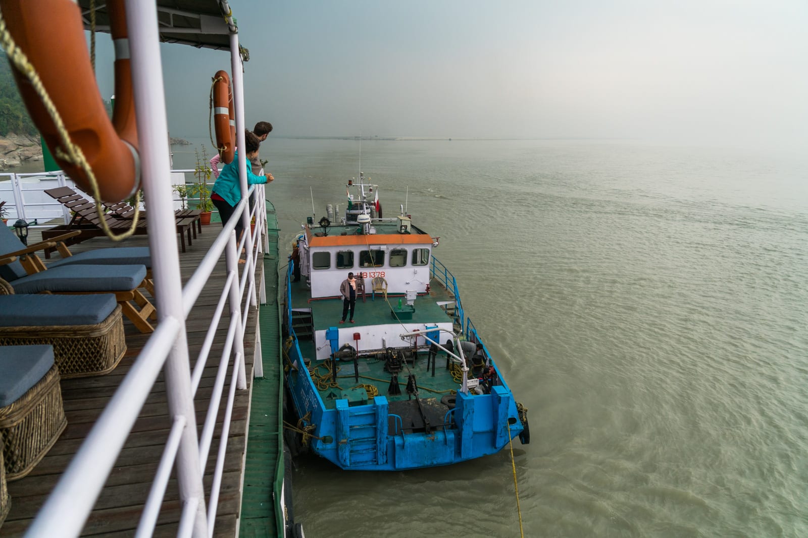 Review of a river cruise on the Brahmaputra with Assam Bengal Navigation - Tugboat pushing the cruise boat - Lost With Purpose travel blog