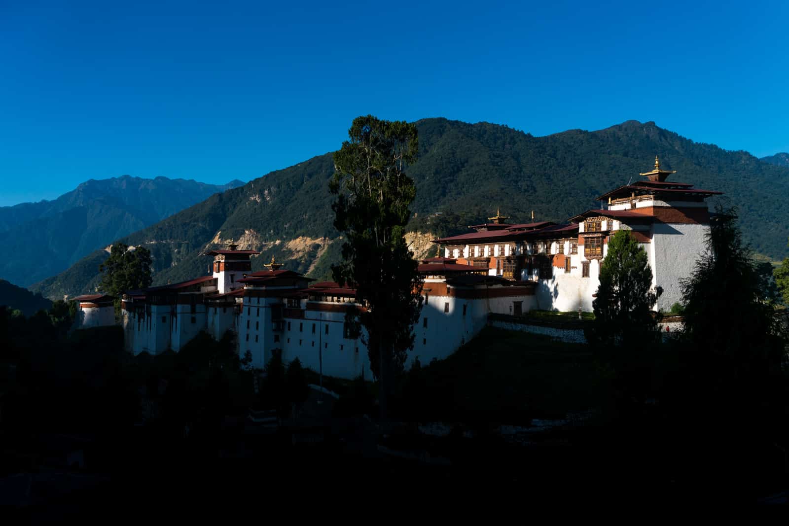 Best places to go off the beaten track in Bhutan - Trongsa dzong at sunrise - Lost With Purpose travel blog