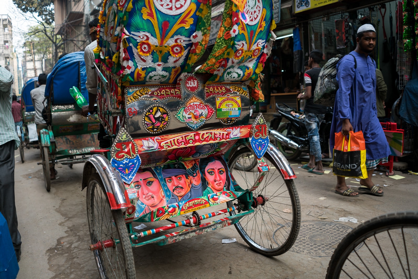 Colorful cycle rickshaws on the streets of Dhaka