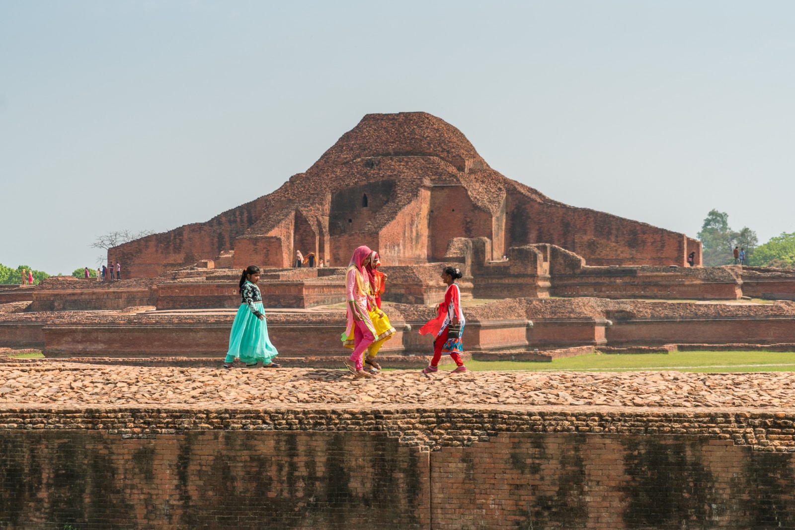 Girls walking at Sompur Mahavihara in Paharpur