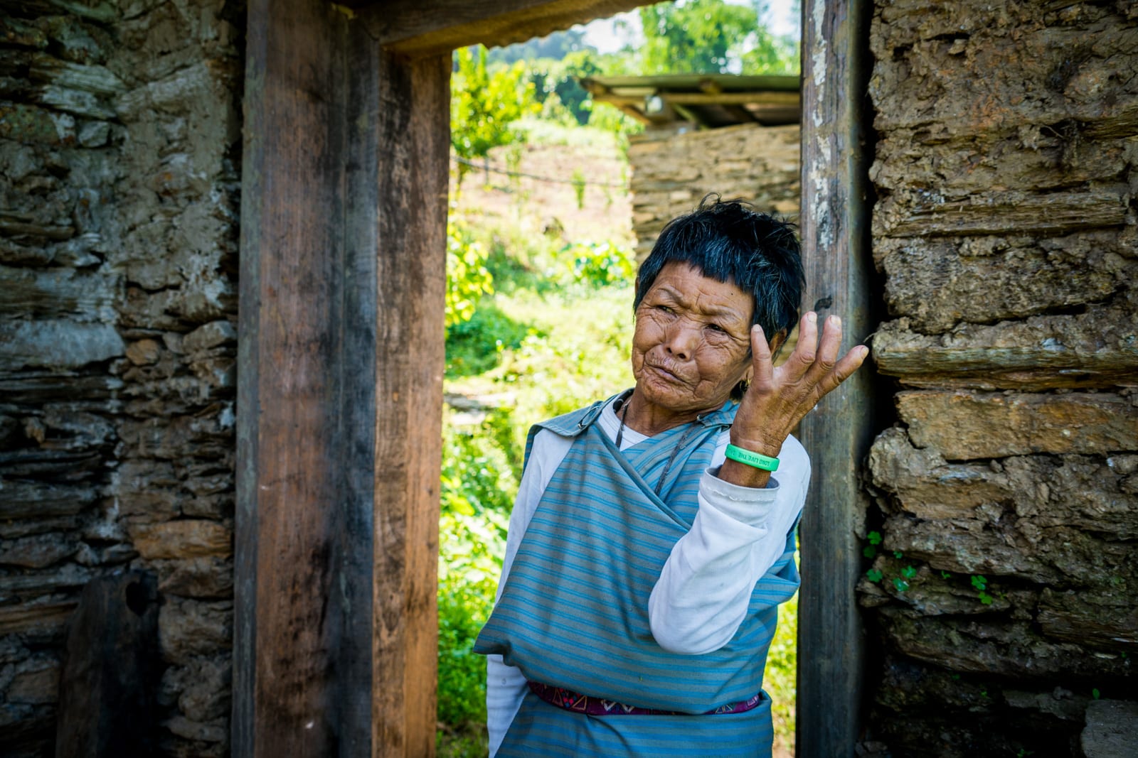 How to go off the beaten track in Bhutan - Old grandmother in Tingtibi - Lost With Purpose travel blog