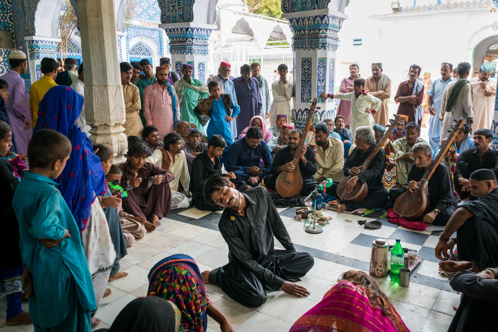 Sindh travel guide - Man in a trance at the shrine of Sufi poet Shah Abdul Latif Bhitai in Bhit Shah, Pakistan - Lost With Purpose travel blog
