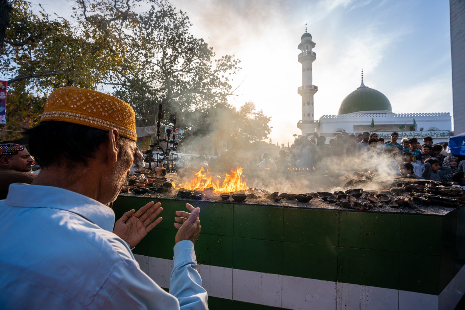 A man praying at a Sufi shrine in Lahore