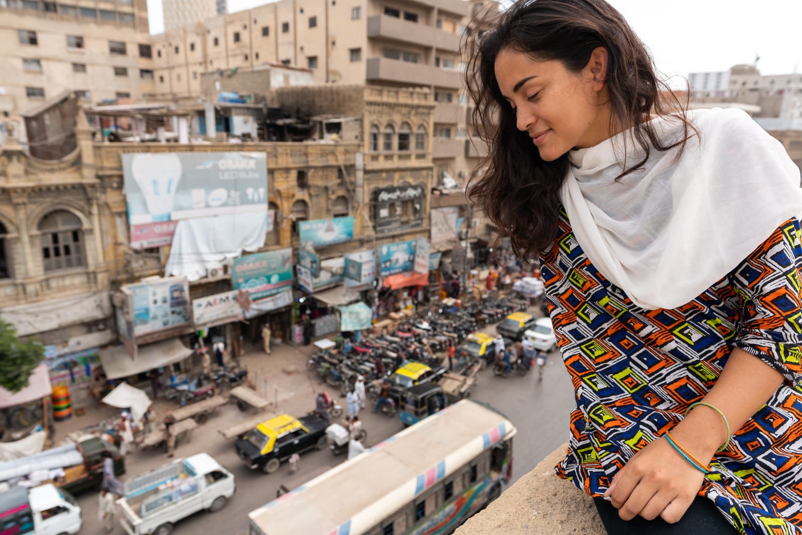 Girl sitting on a roof in Karachi, Sindh