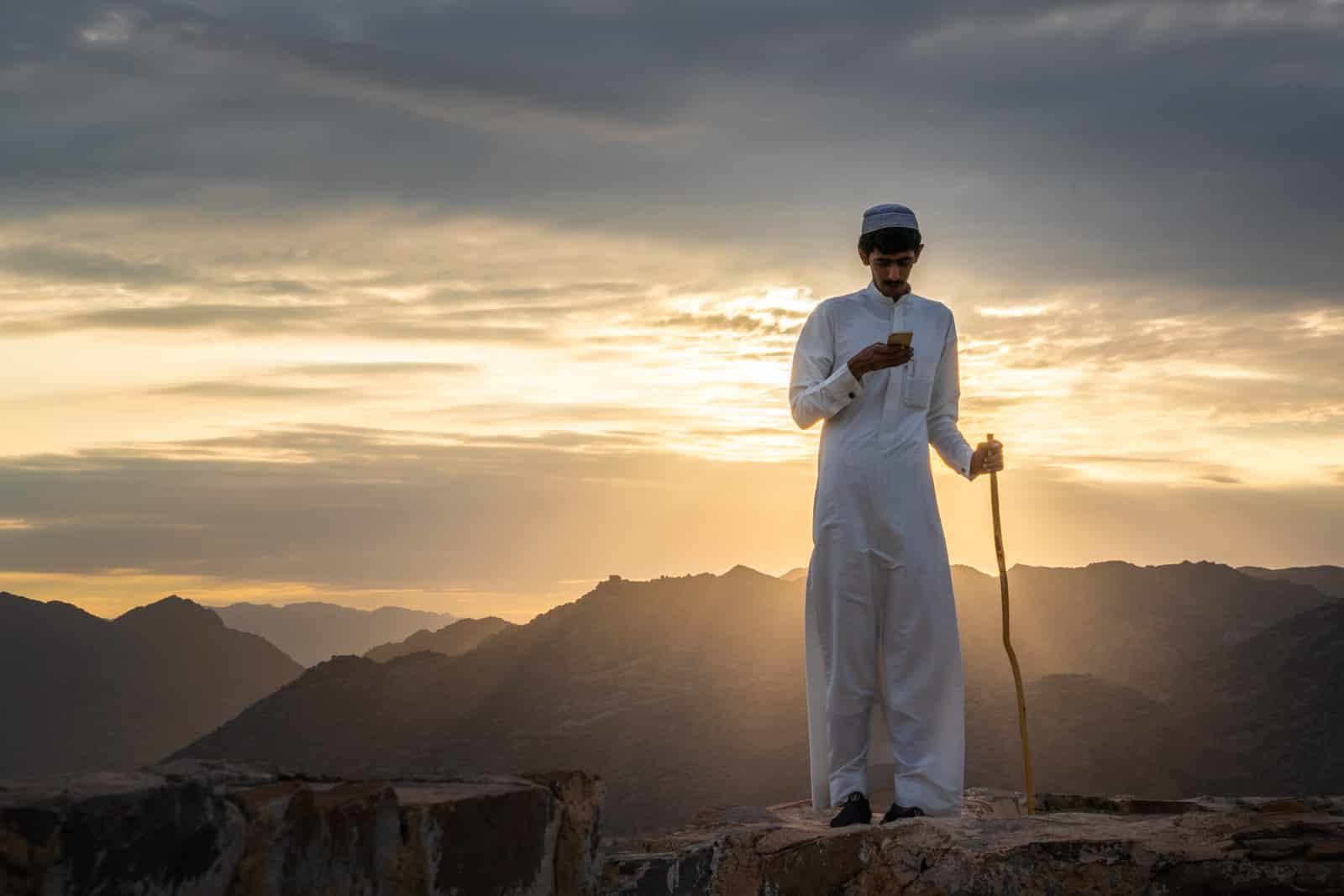Boy on phone in Saudi Arabia