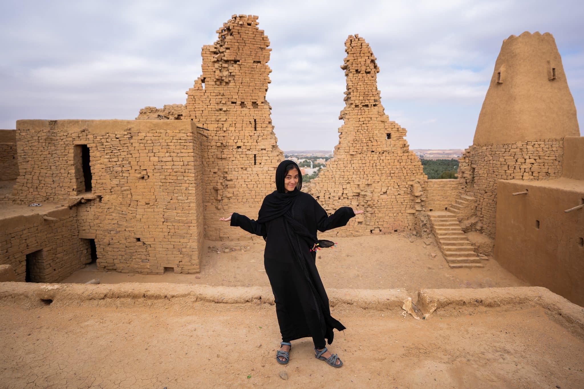 Female traveler in abaya in Saudi Arabia