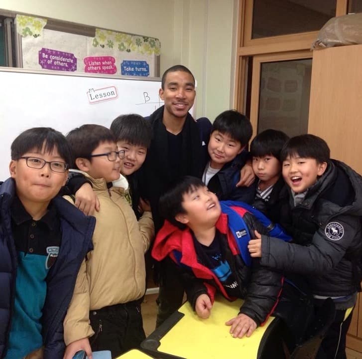 Tyreek with English students in South Korea