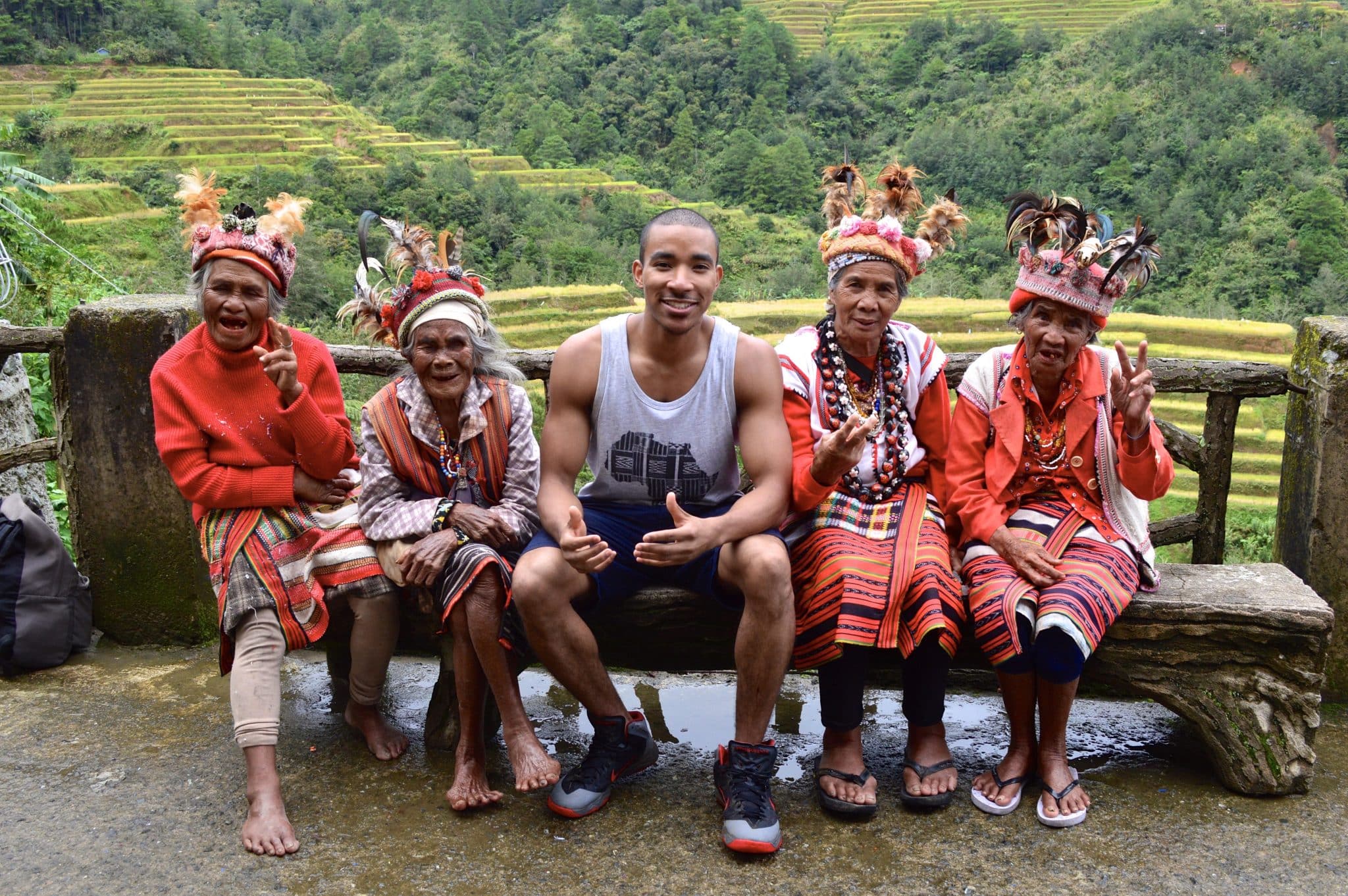 Tyreek with old women in the Philippines